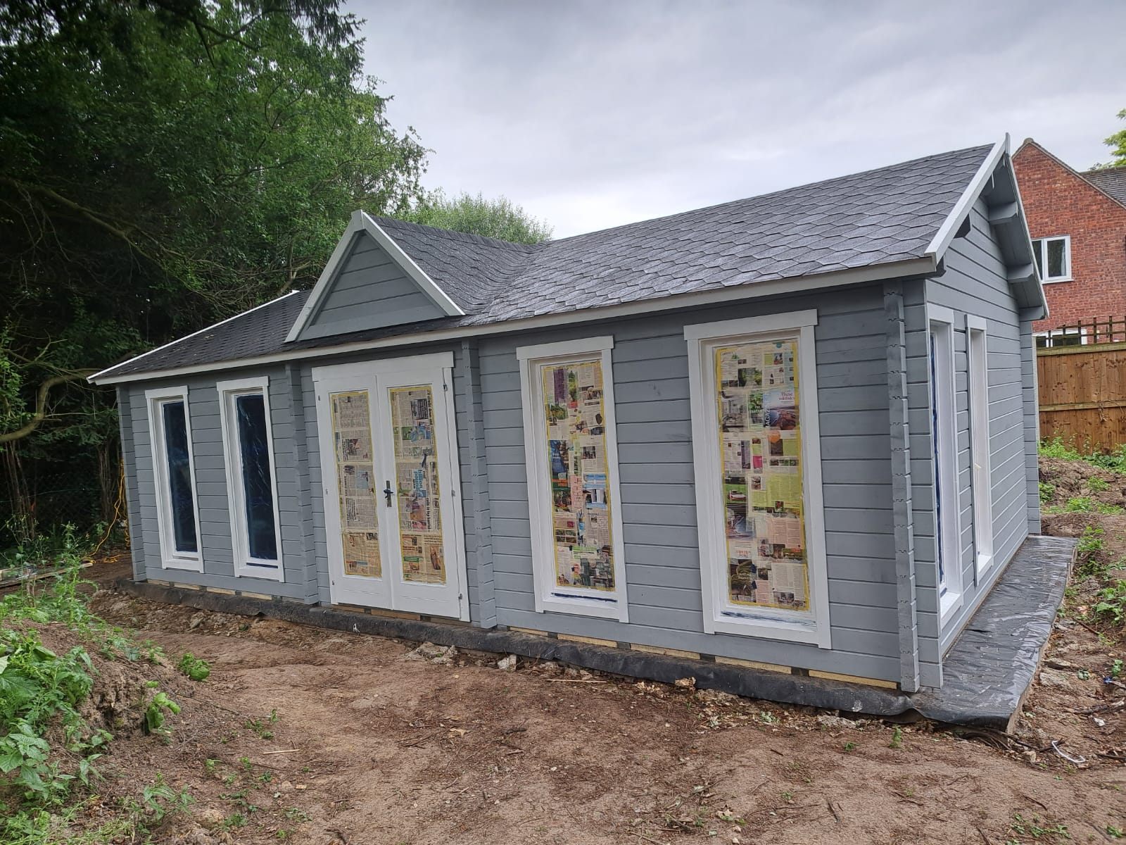 grey wooden shed